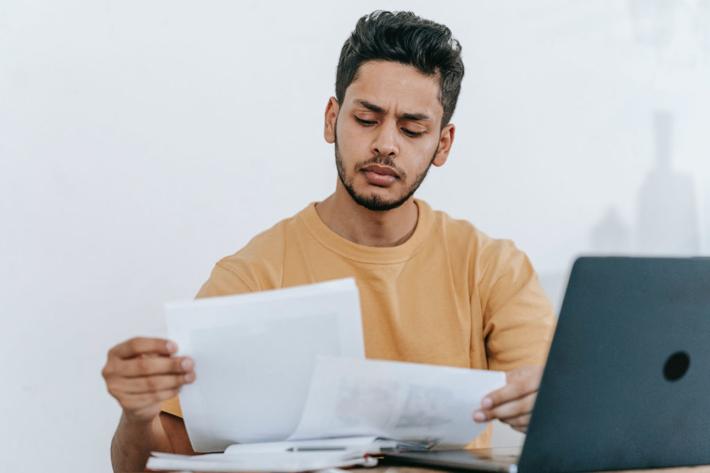 Man looking through documents